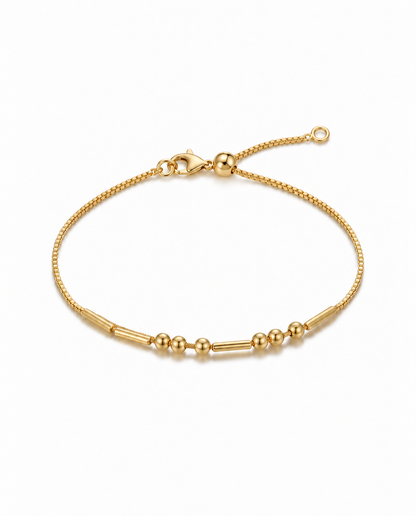 Bracelet doré en code Morse avec fermoir mousqueton et boule coulissante réglable